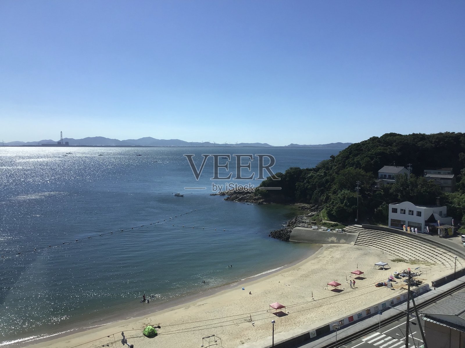 信岛的沙滩被称为太阳太阳海滩照片摄影图片