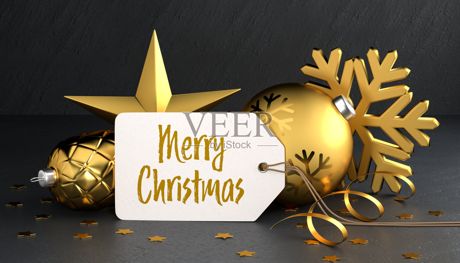 圣诞-礼物标签与信息“圣诞快乐”在一个黑色的石头背景倚着金色的圣诞装饰品照片摄影图片