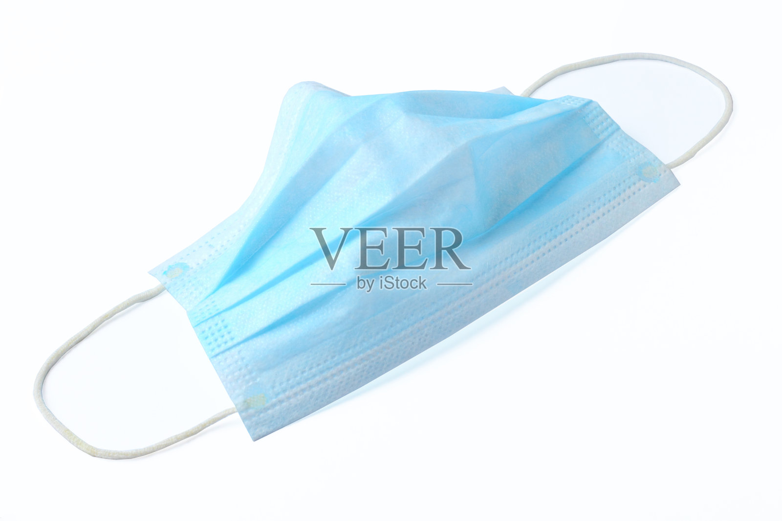 医用口罩特写以白色为背景，概念抗击2019冠状病毒病等传染病。照片摄影图片