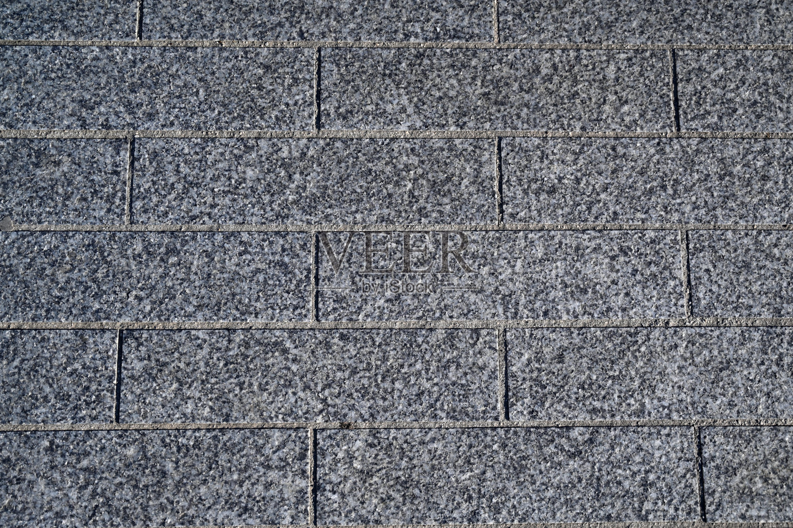 灰黑色的沥青质地。沥青道路。照片摄影图片