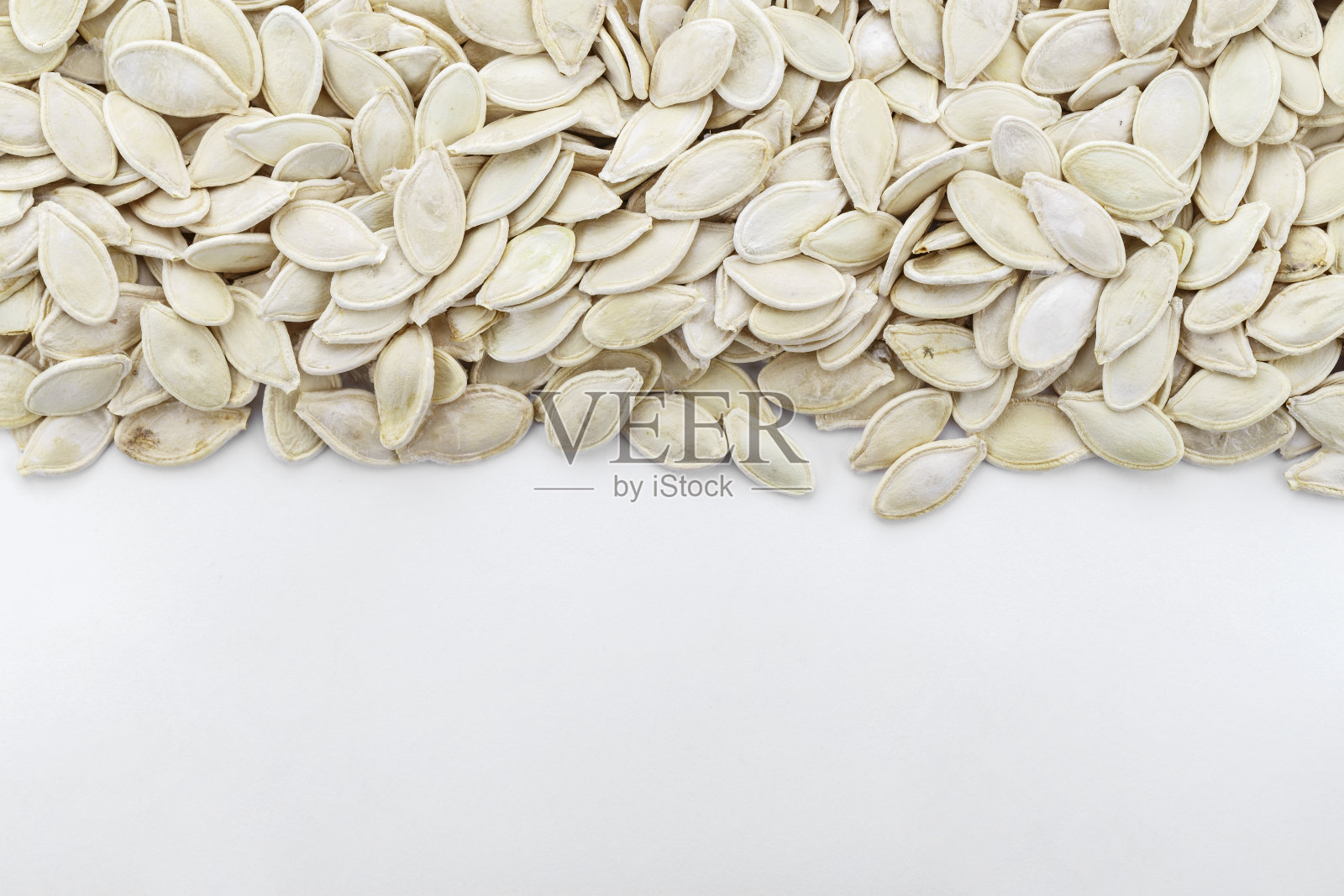 南瓜种子的背景。空间的文本。照片摄影图片