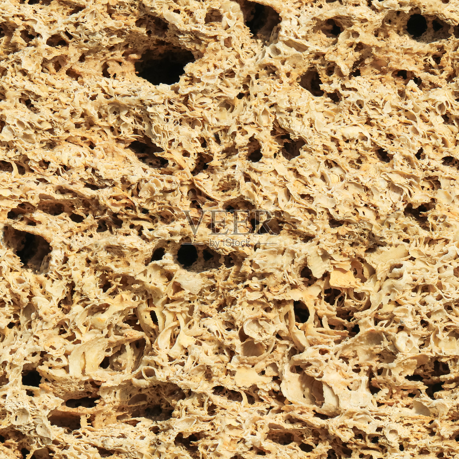 一堵石墙作为背景。无缝纹理照片摄影图片