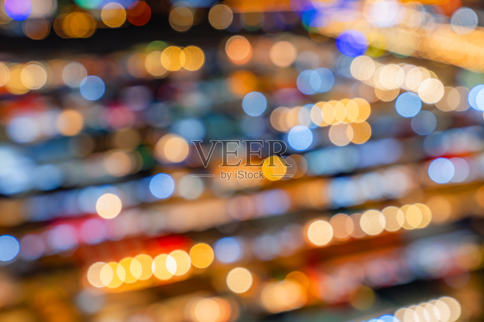 Bokeh blur曼谷城市商业中心和火车夜市Ratchada，泰国。照片摄影图片