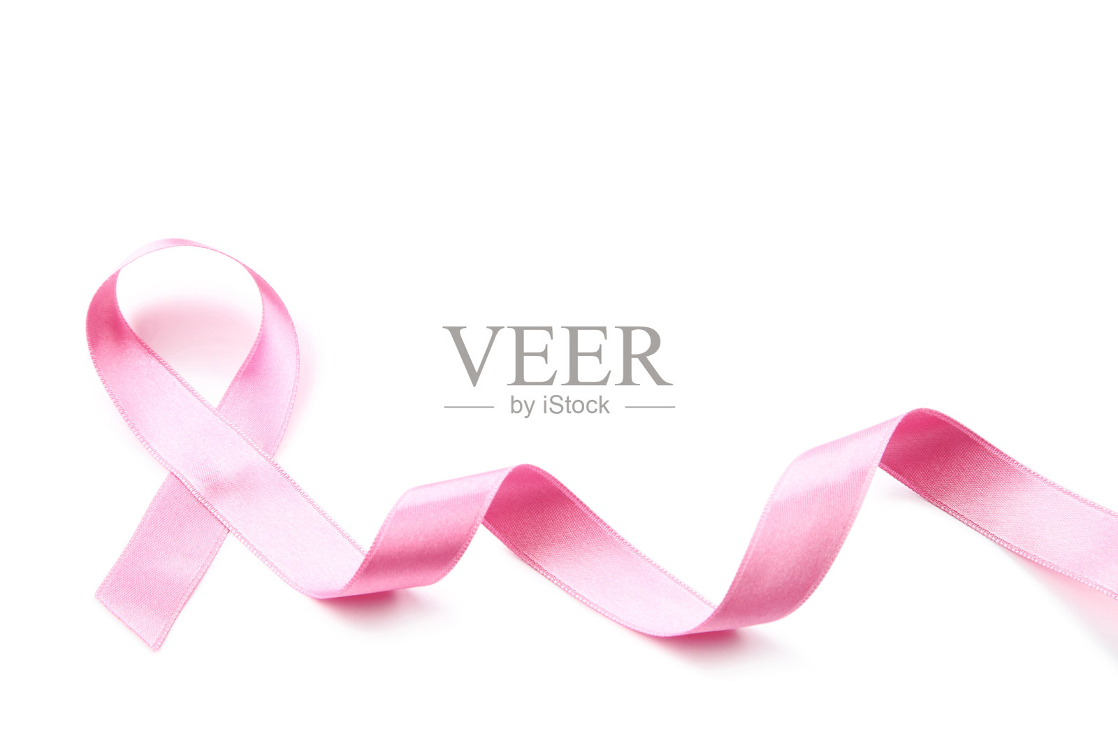 癌症的概念。粉色丝带孤立在白色背景上照片摄影图片