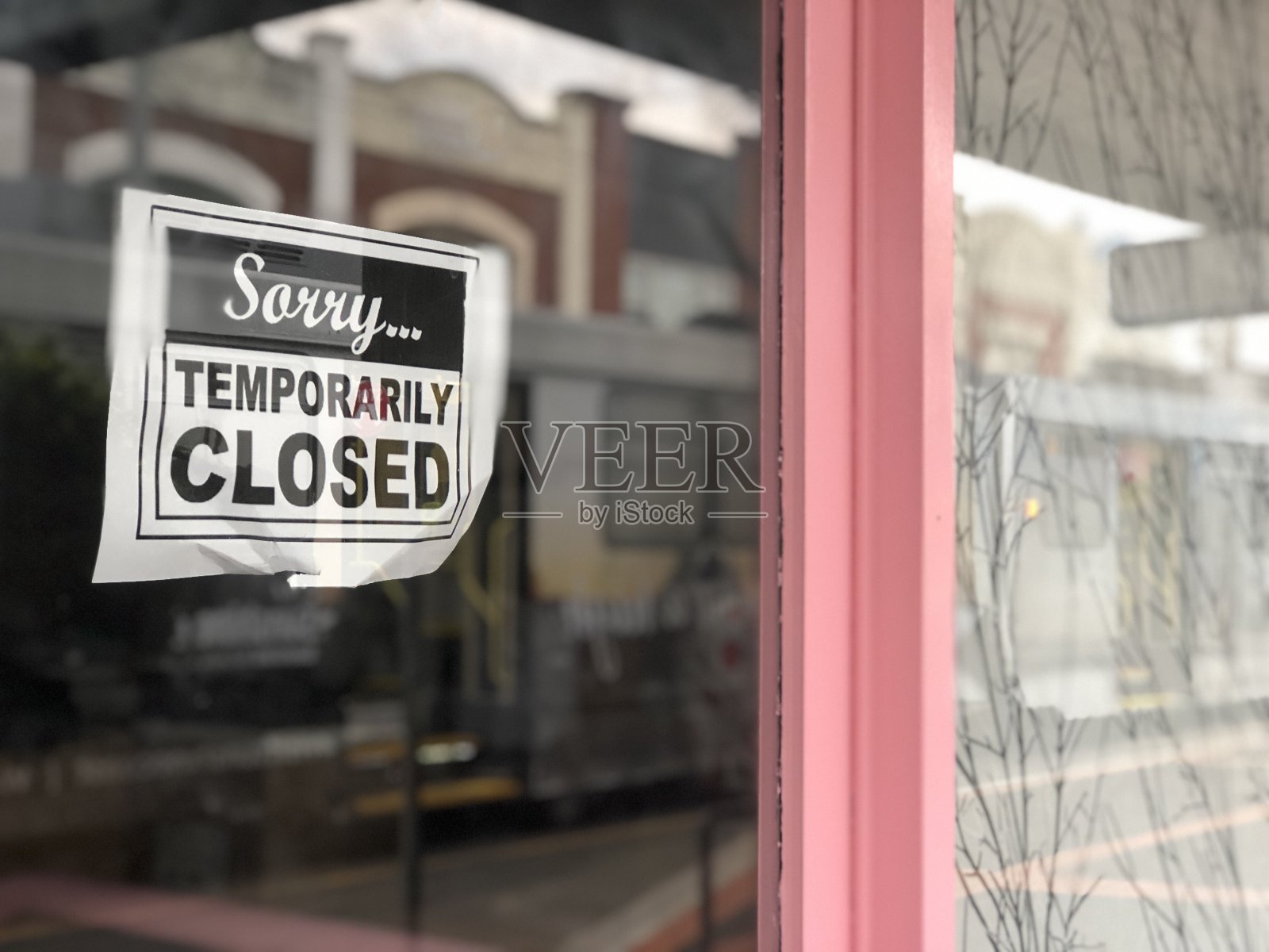 商店门口的关门标志照片摄影图片