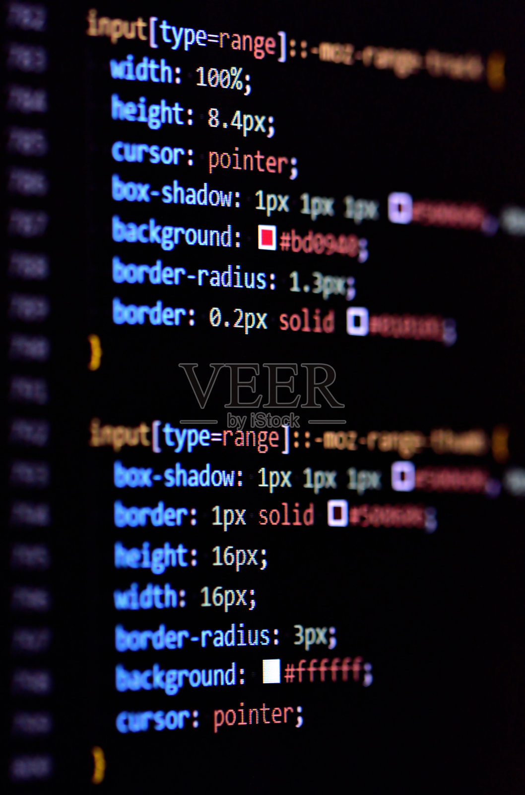 特写的现代CSS3级联样式表编程代码的HTML编码。垂直的照片。照片摄影图片