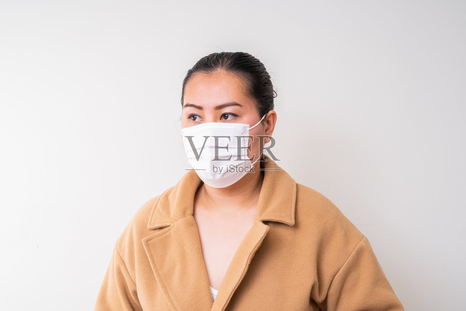 亚洲妇女戴外科口罩预防流感冠状病毒照片摄影图片