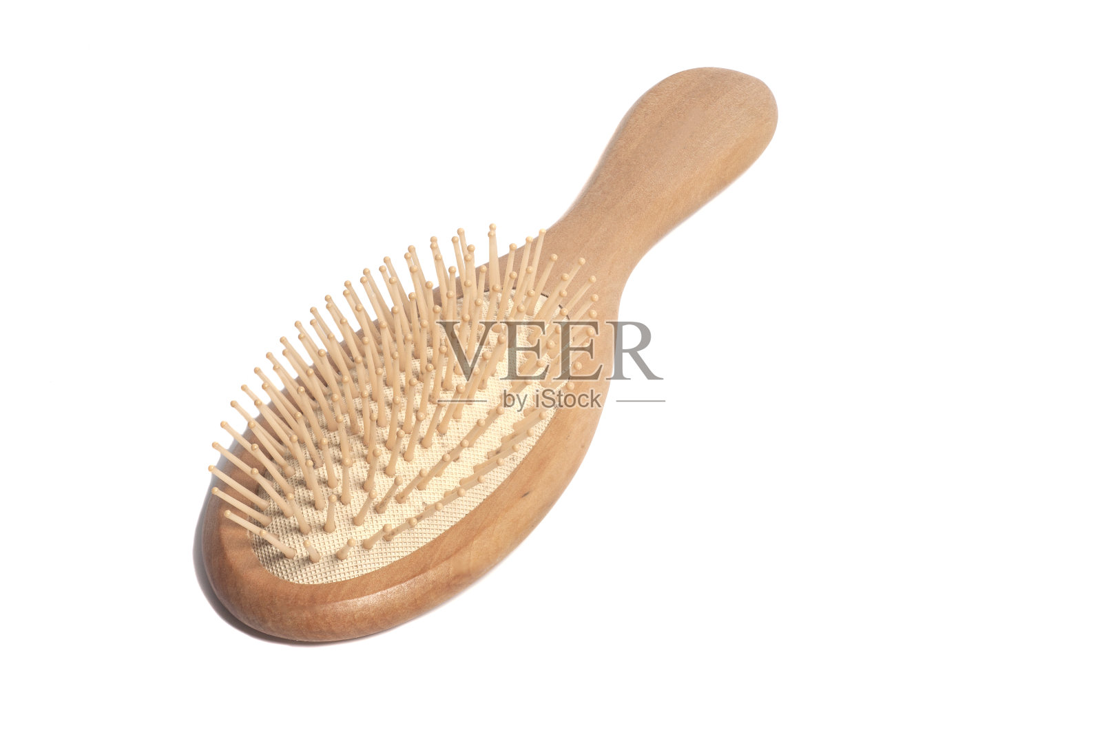木制按摩发刷孤立在白色背景上照片摄影图片