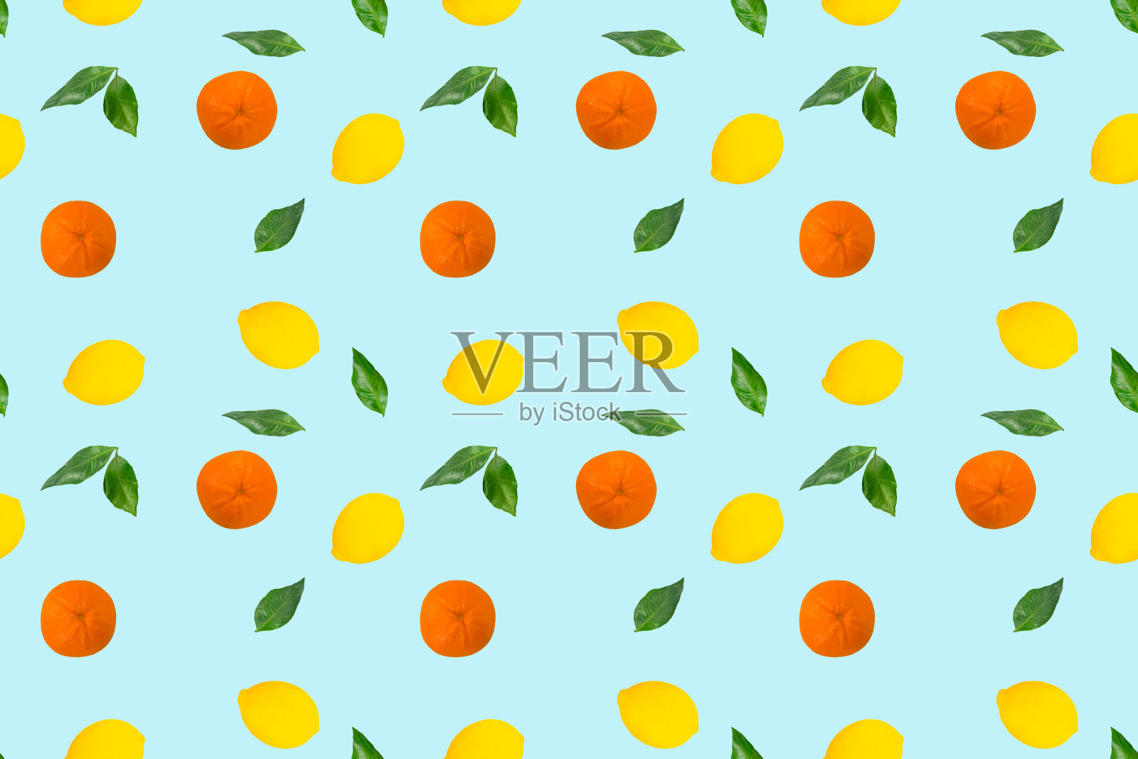 柑橘类水果无缝模式在浅蓝色的背景照片摄影图片