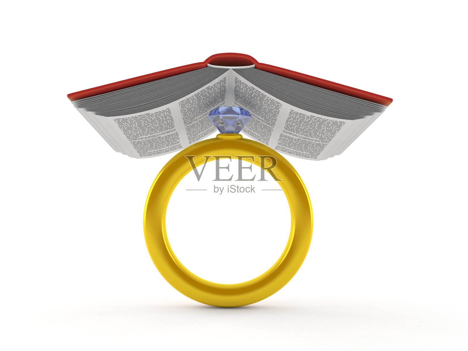 订婚戒指在书下照片摄影图片