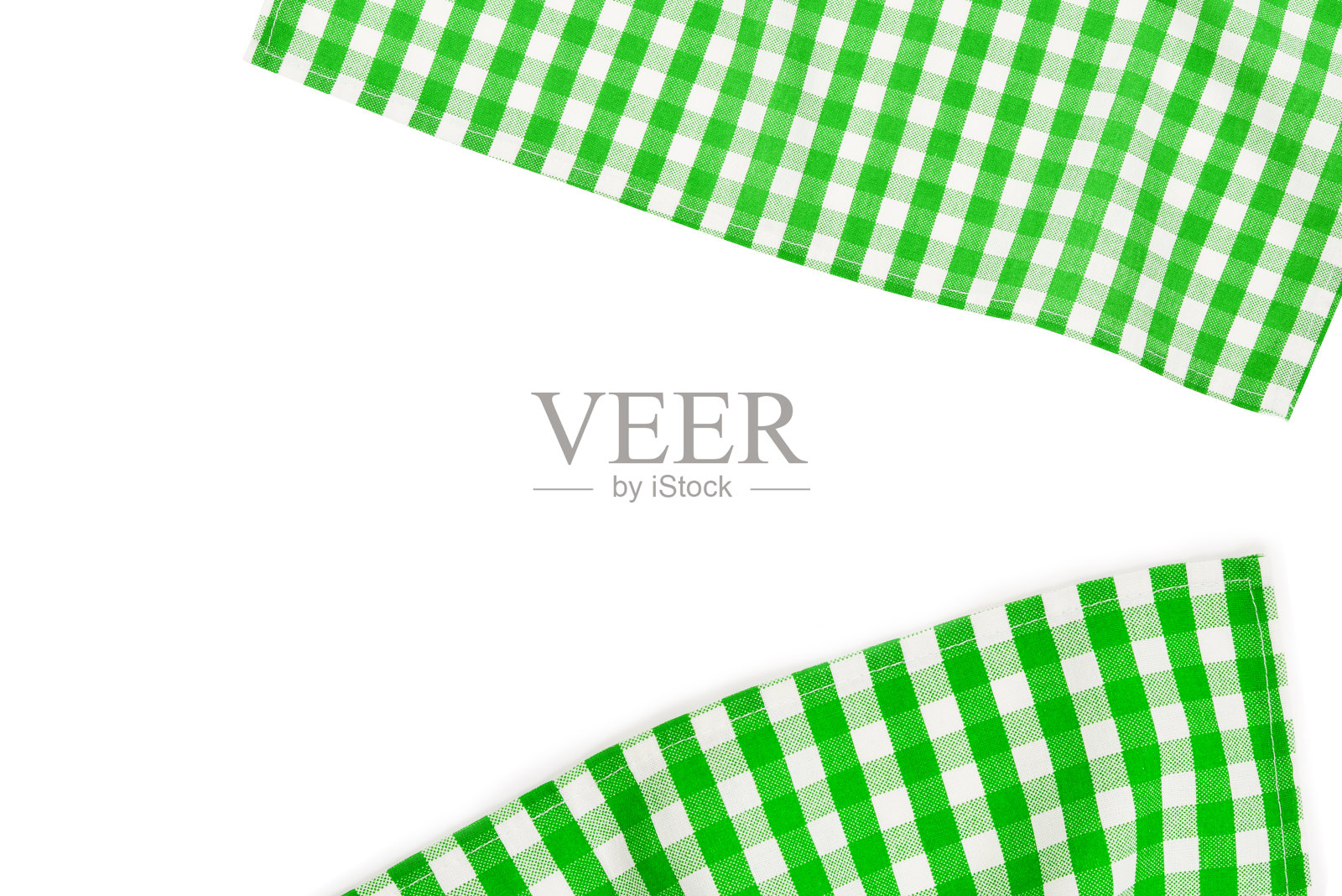 绿色餐巾孤立在白色背景上。副本的空间。照片摄影图片