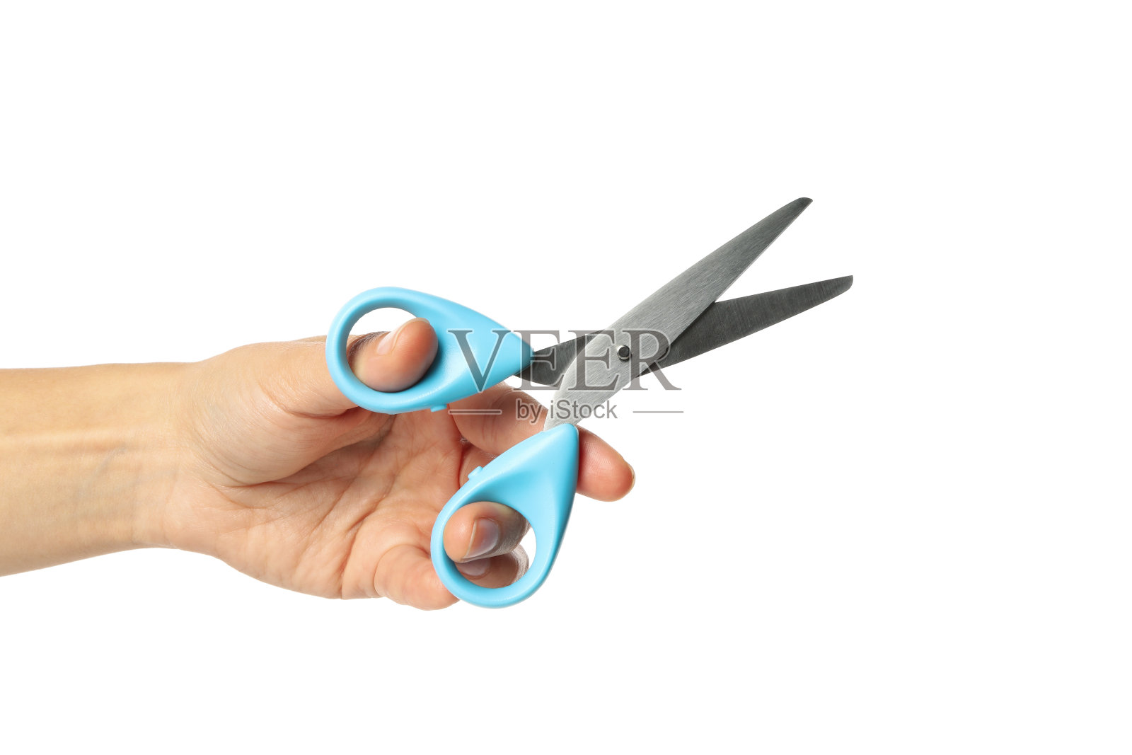 女性手与剪刀孤立在白色背景照片摄影图片