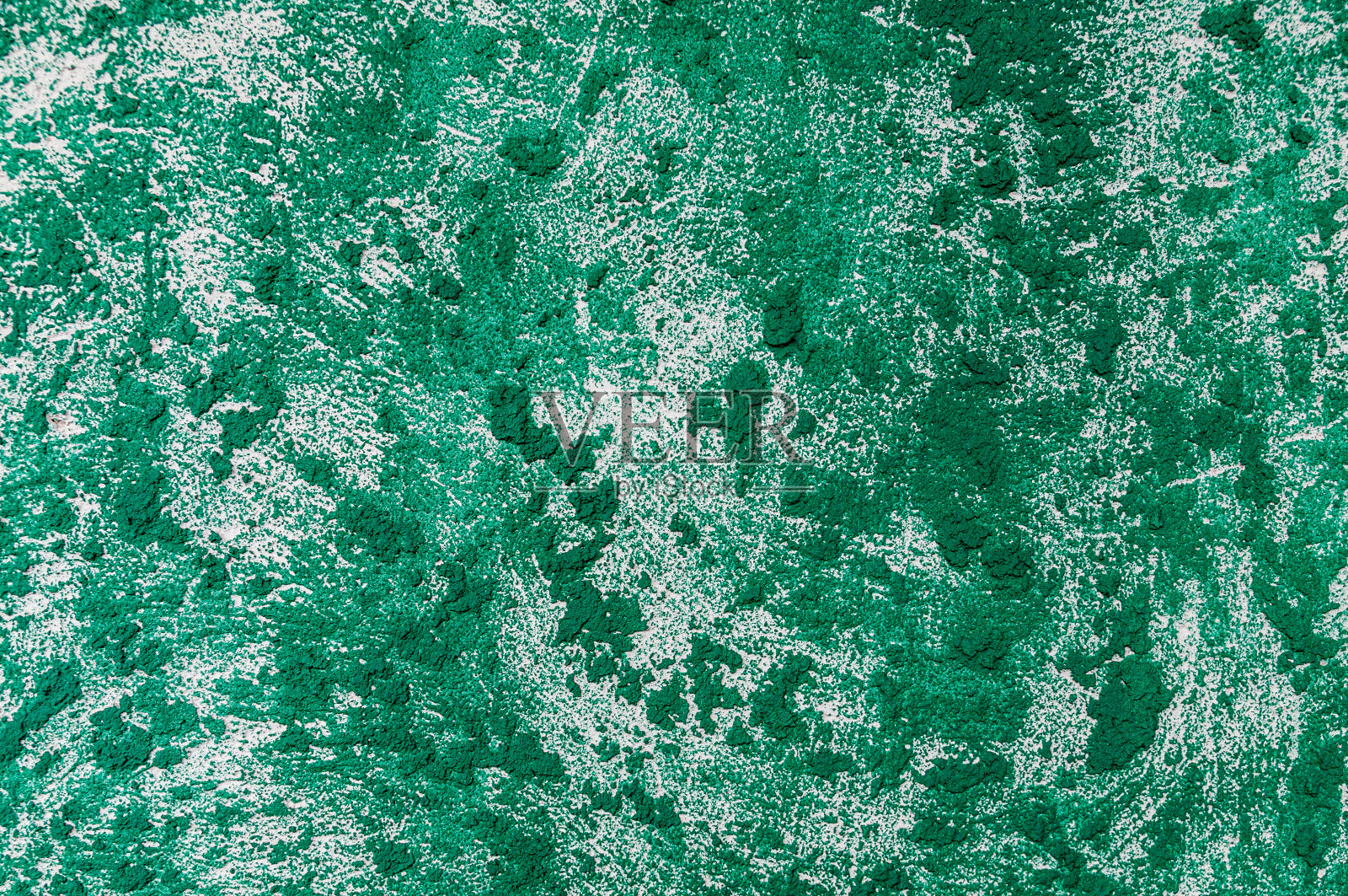 墙壁上覆盖着浮雕灰泥，漆成绿色照片摄影图片