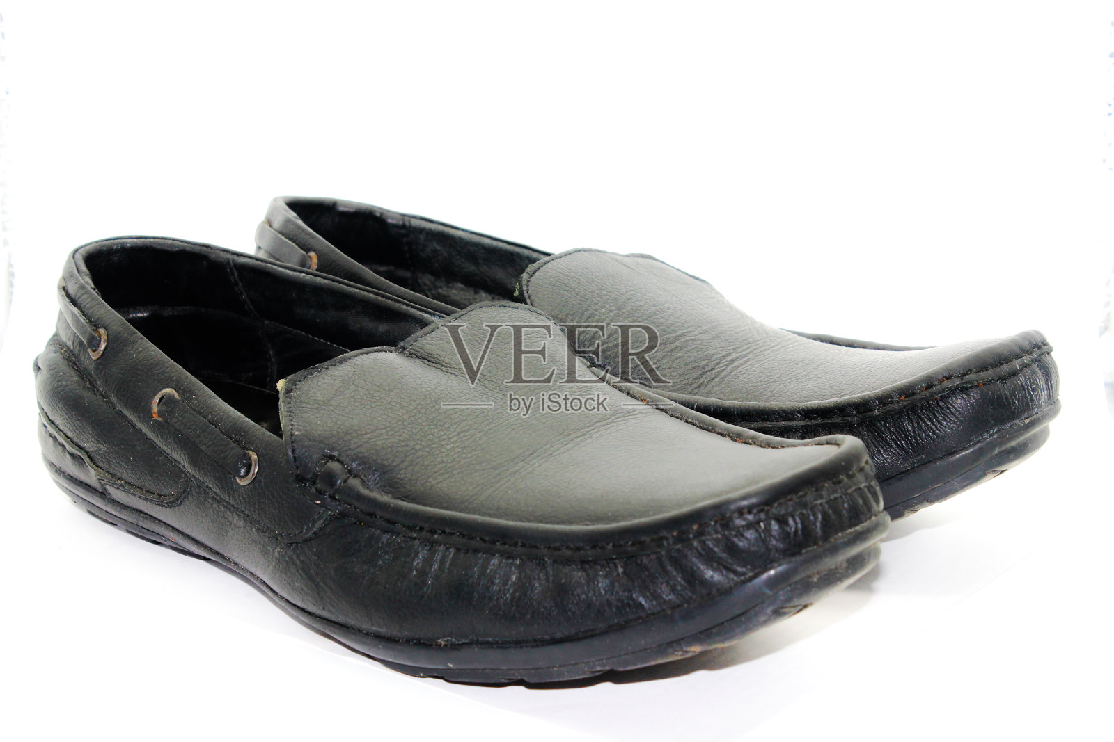 黑色皮鞋为男性孤立的白色背景与选择性焦点照片摄影图片