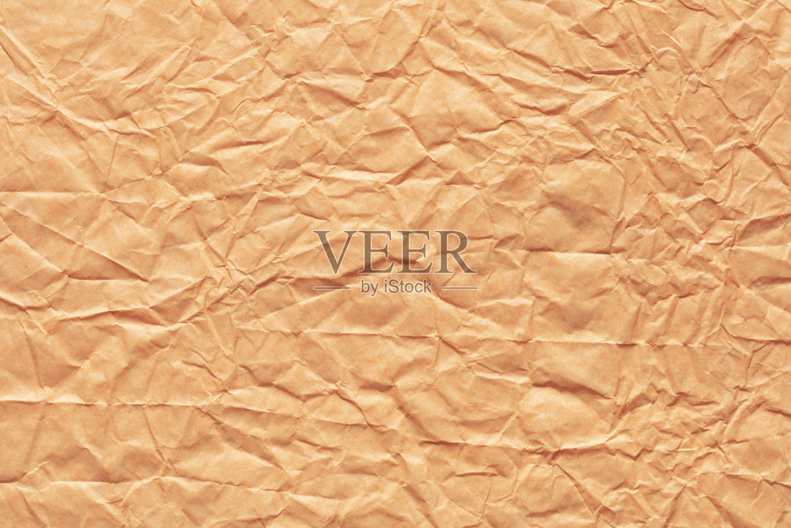 皱巴巴的纸背景桃色为您的新时尚贺卡。照片摄影图片