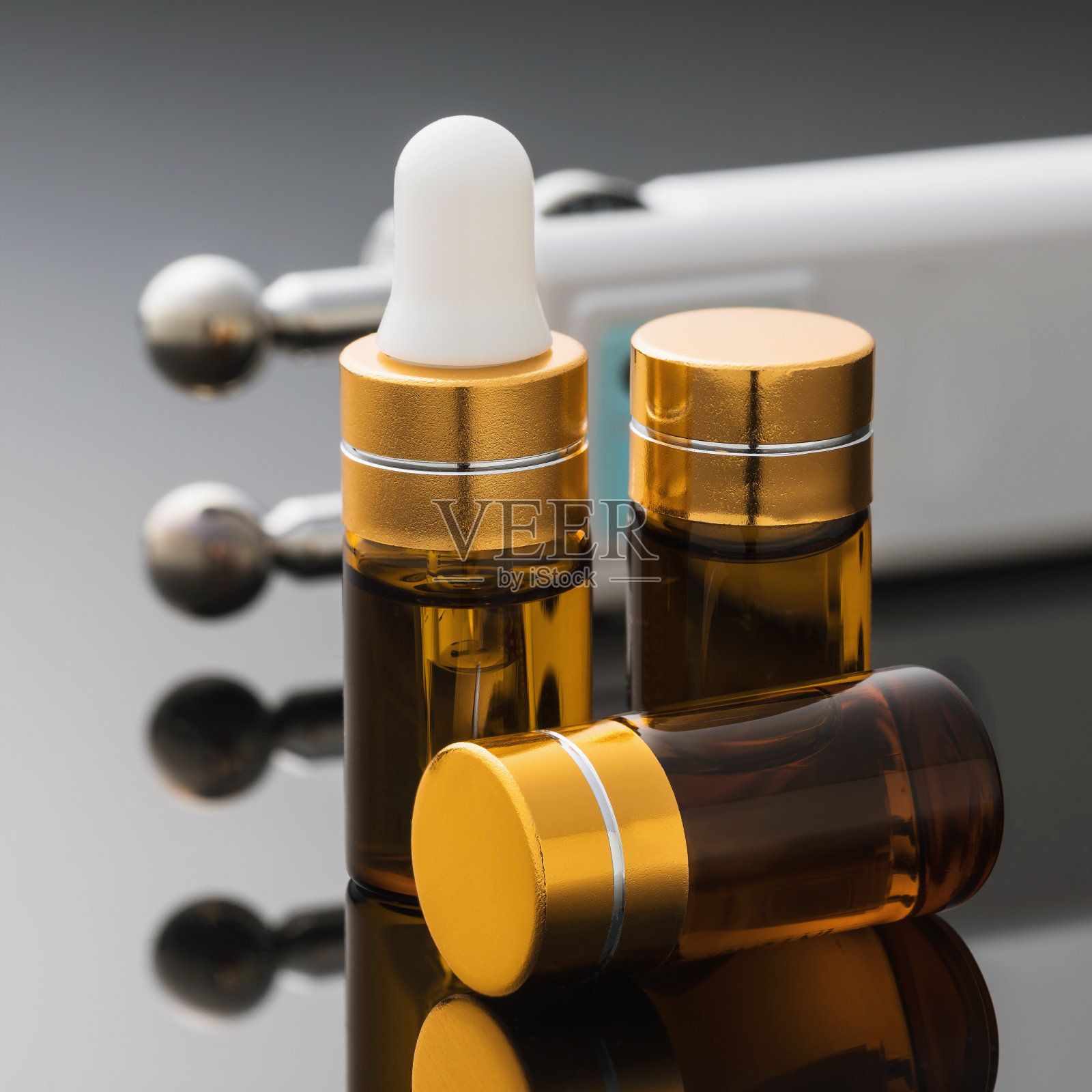 凝胶和装置微电流刺激面部肌肉的梯度背景，特写照片摄影图片