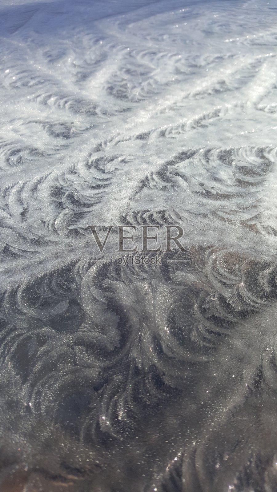 玻璃桌面上结霜照片摄影图片