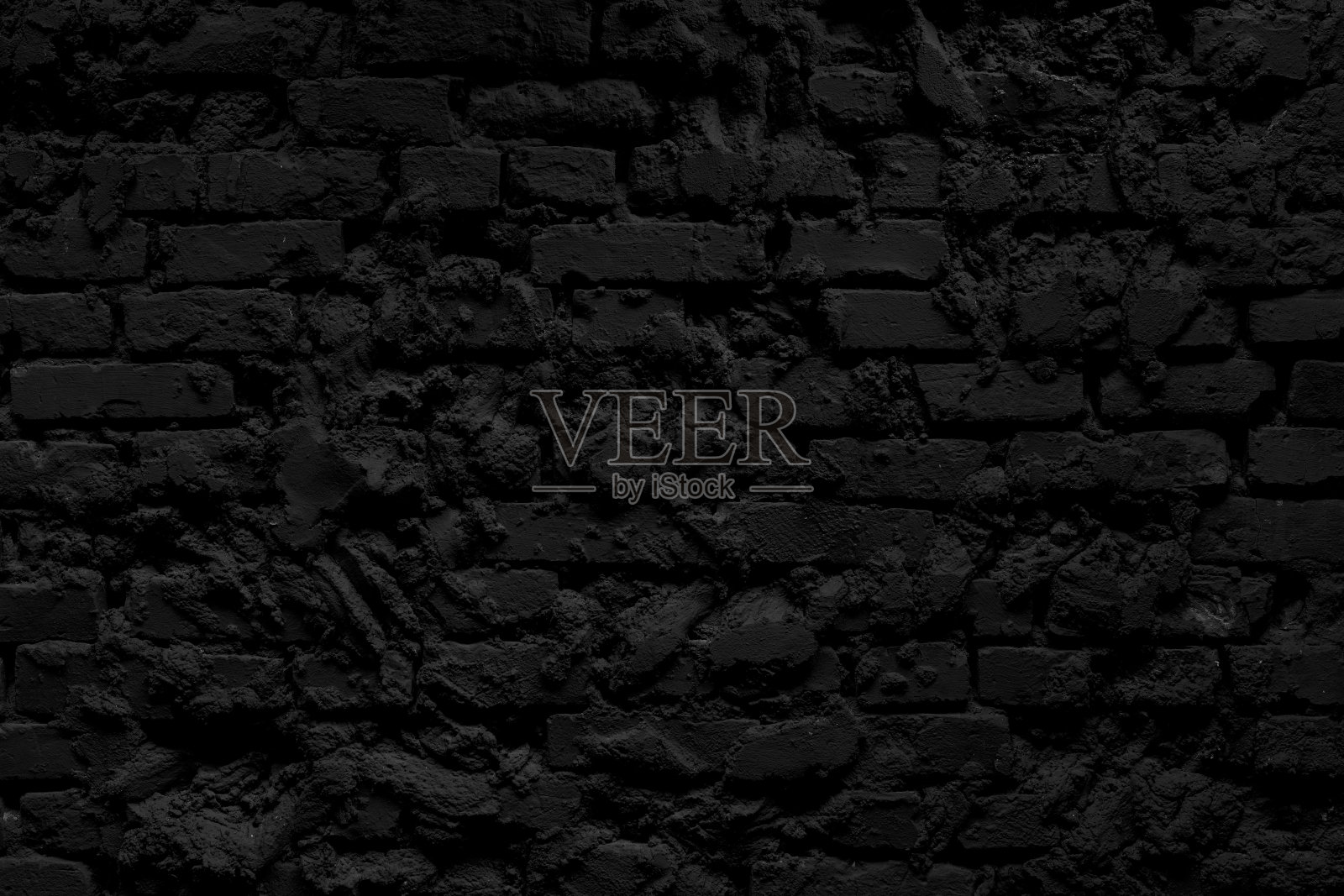 黑色的砖墙。照片摄影图片