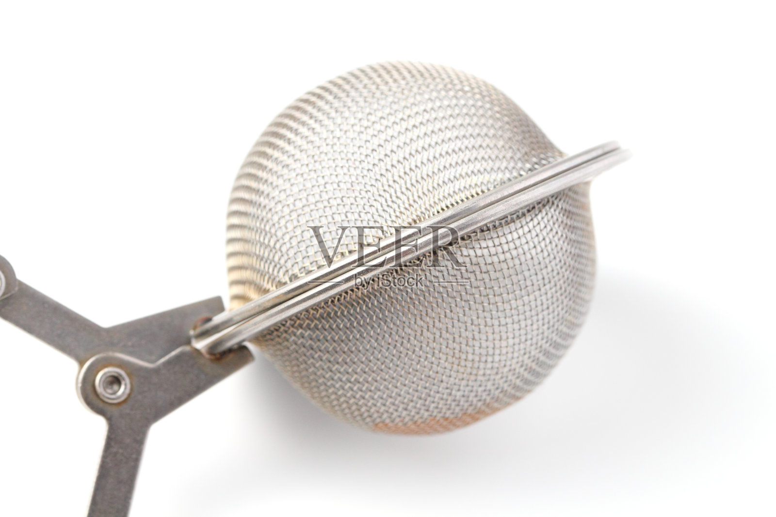 滤茶器特写，白色背景，孤立。照片摄影图片