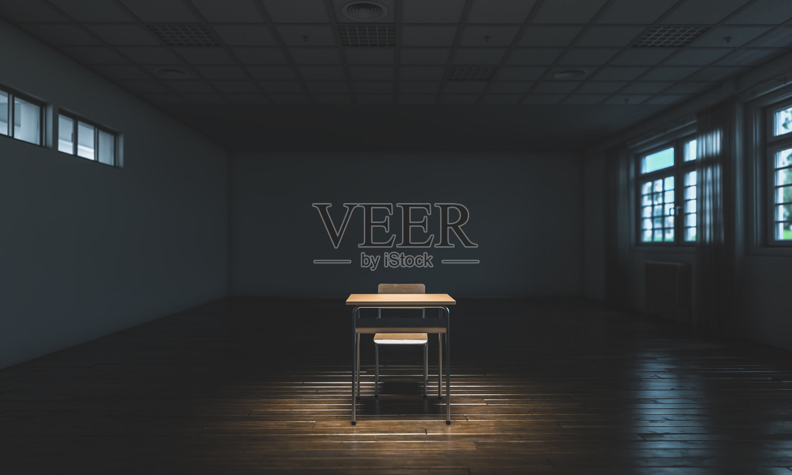 孤独的教室书桌与木地板。照片摄影图片