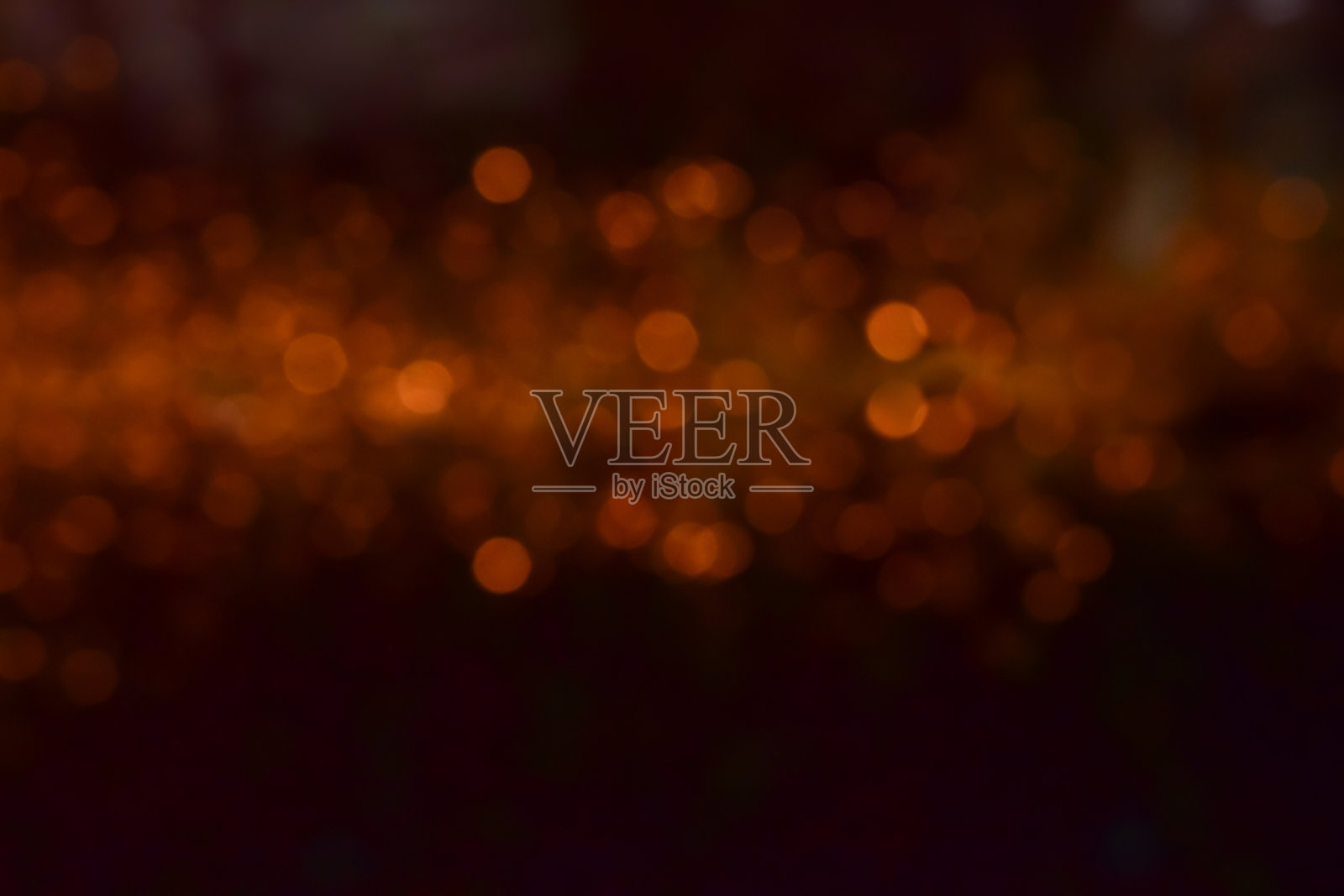 红色闪烁的复古灯光背景。散焦照片摄影图片