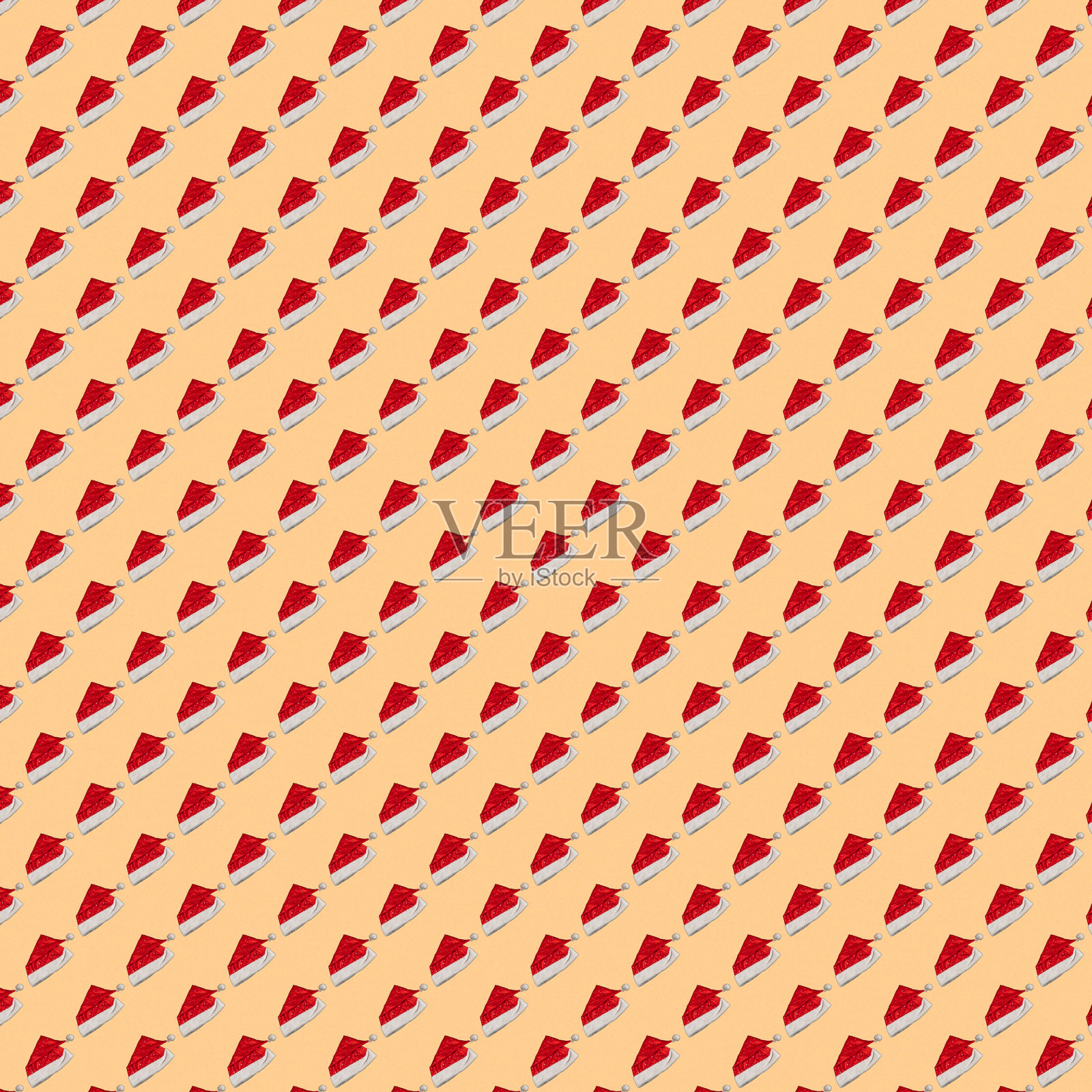 无缝图案的圣诞老人的帽子在一个乳白色，光的背景。印刷、设计照片摄影图片