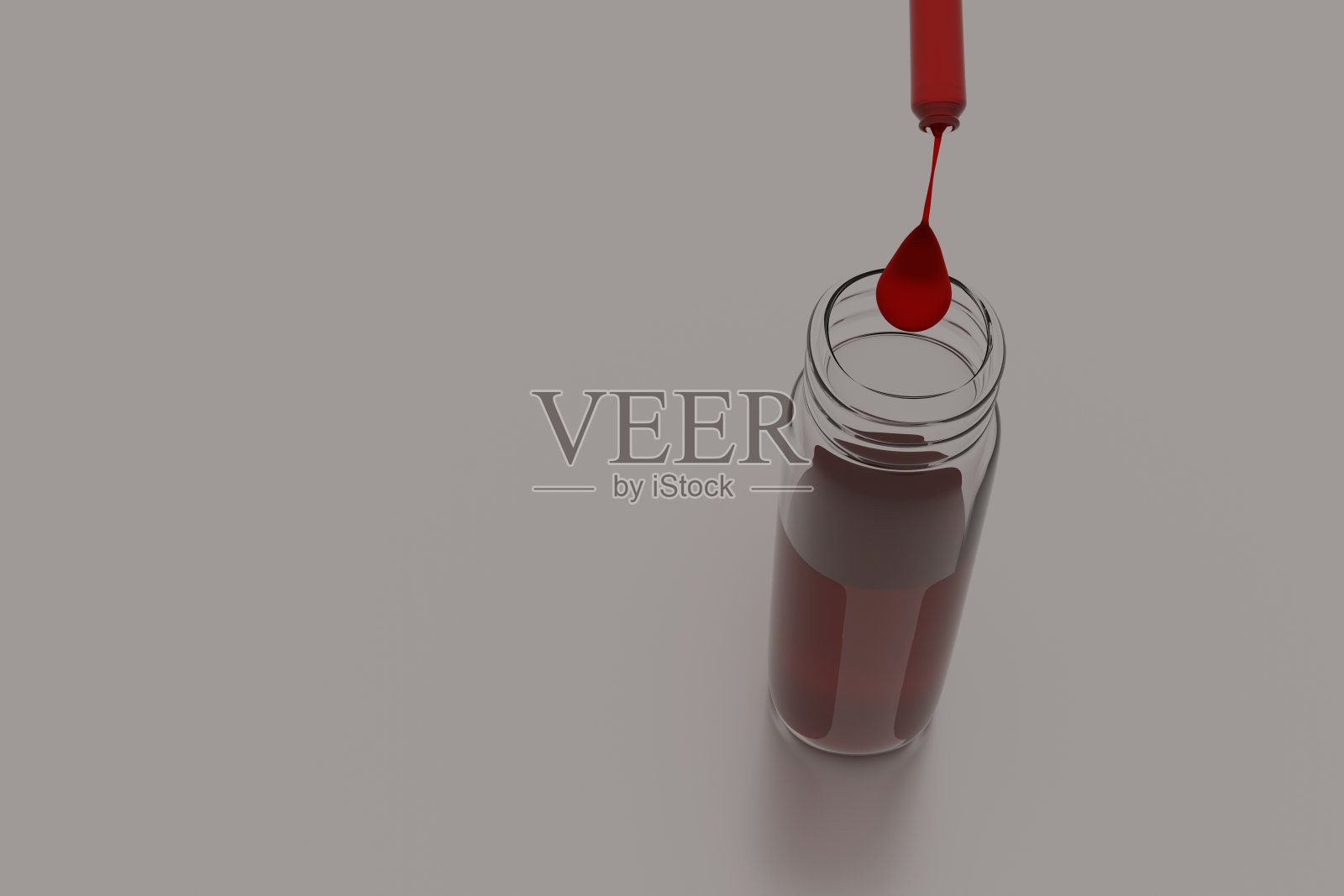 小瓶北极磷虾油和一滴磷虾萃取液悬挂在小瓶上方。照片摄影图片