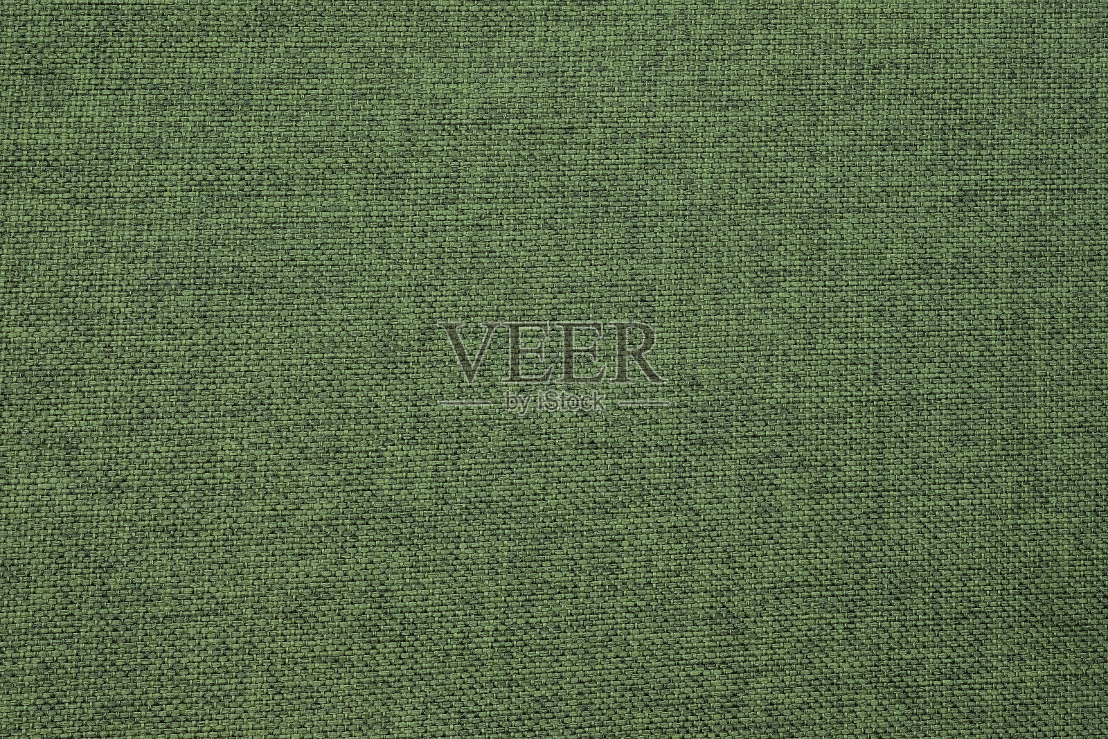 绿色面料，纺织背景。粗棉麻表面。照片摄影图片