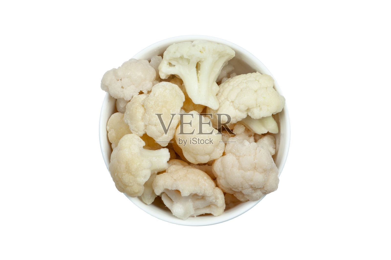 冷冻花椰菜小花在碗孤立的白色背景，俯视图照片摄影图片