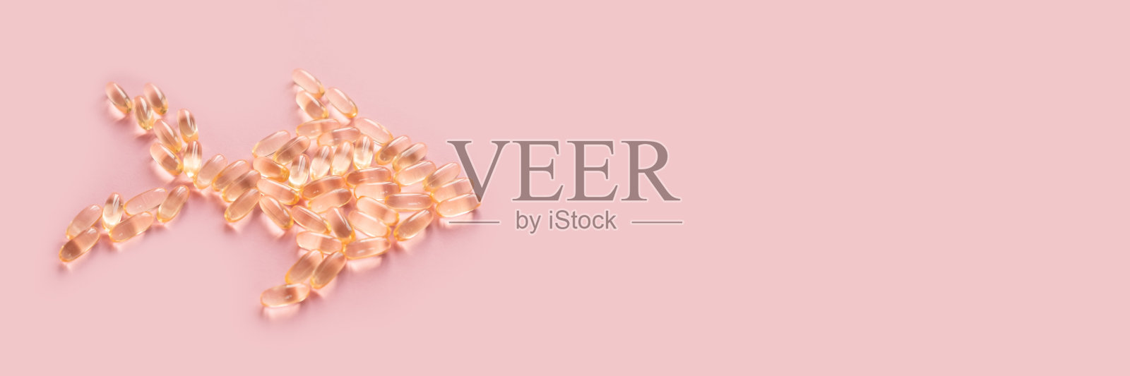 鱼形鱼肝油胶囊，欧米茄3，维生素D照片摄影图片