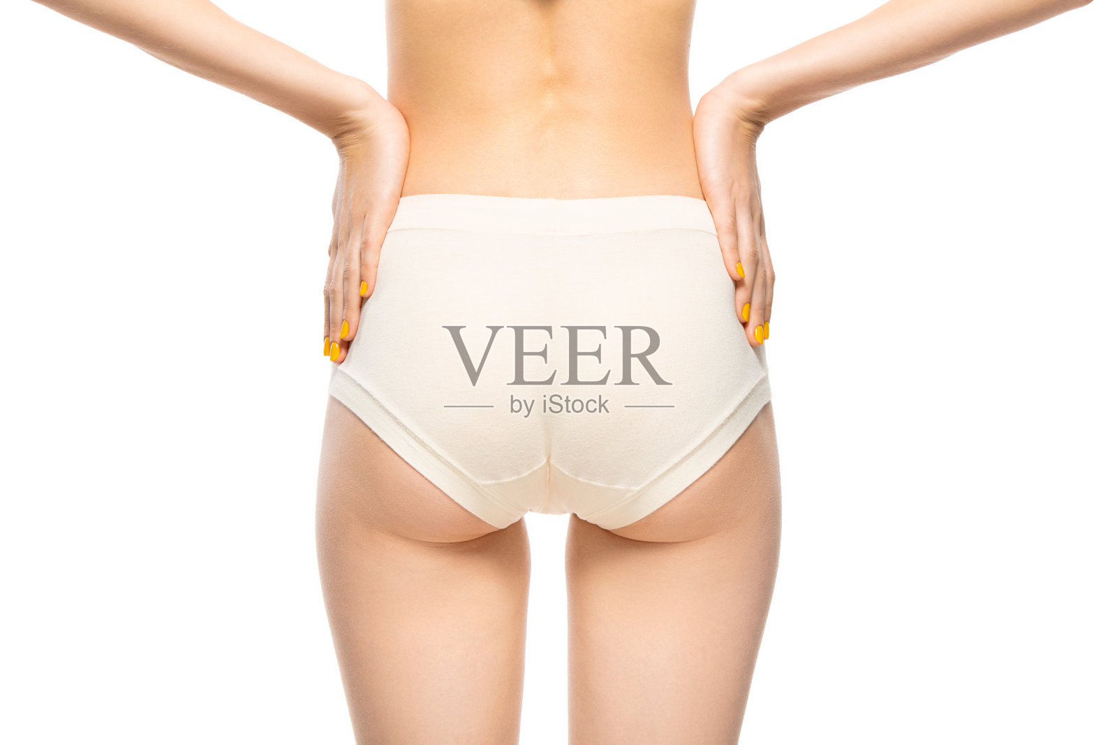 美丽的女性背部孤立在白色的背景。美容、美容、水疗、脱毛、饮食、治疗、健身理念、感官摆姿势照片摄影图片