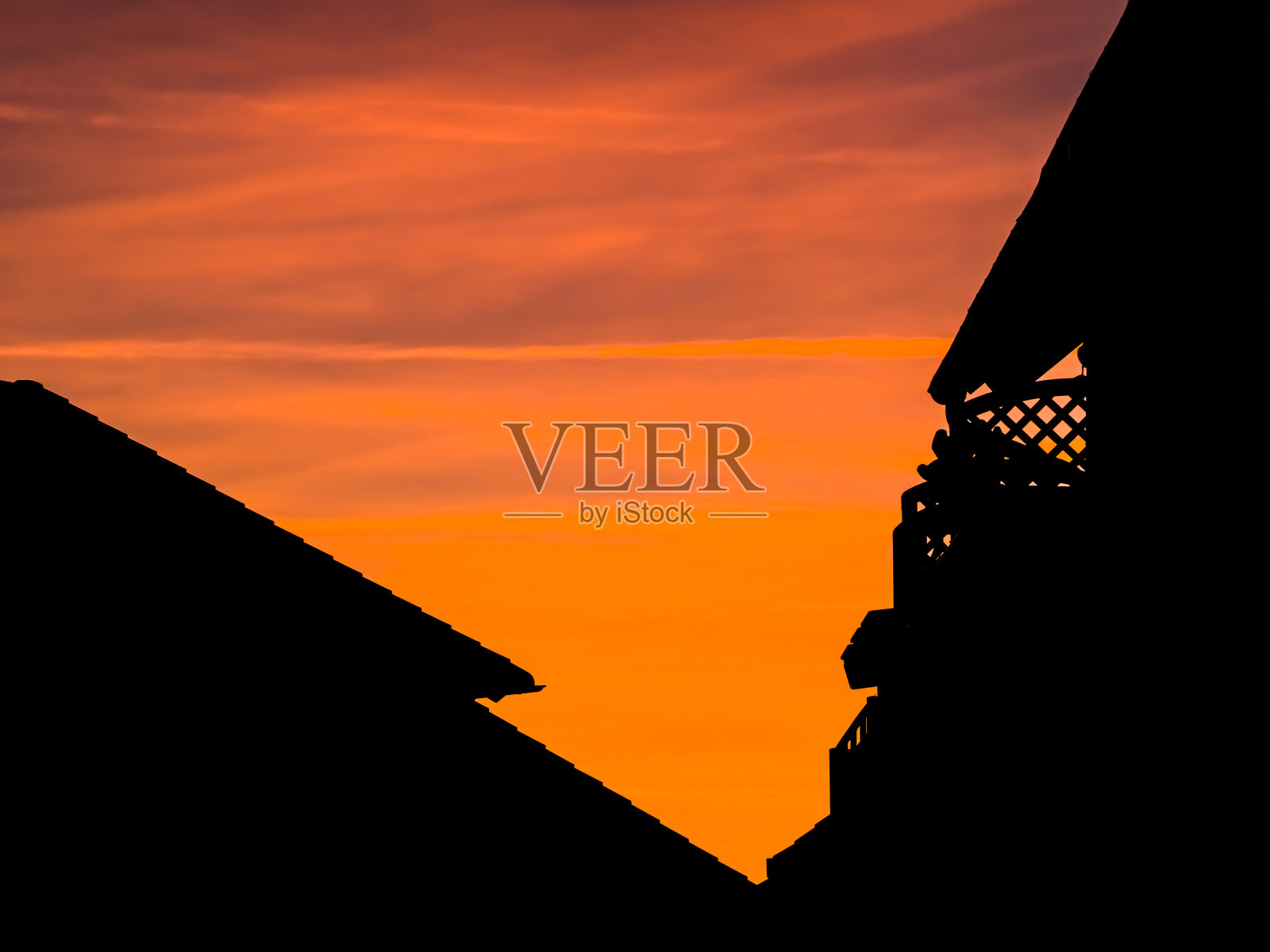 日落之间的房子照片摄影图片