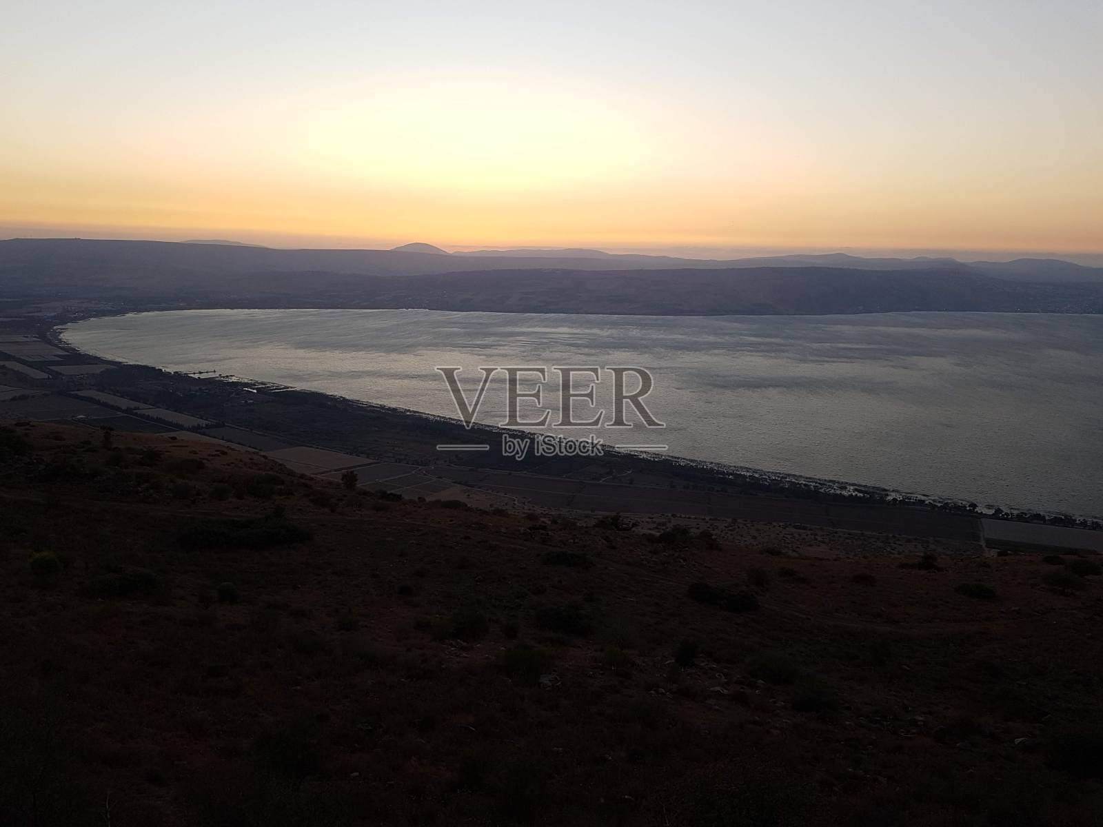 加利利海的日落照片摄影图片