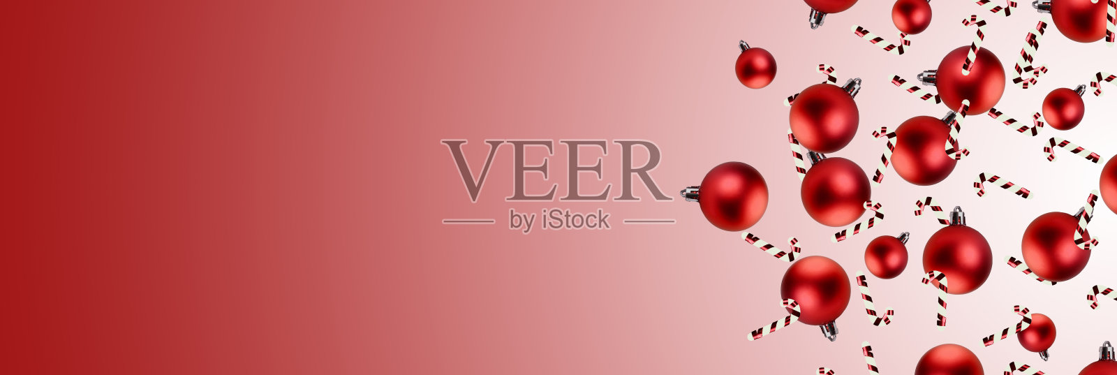 粉红白色背景上的圣诞玩具悬浮照片摄影图片