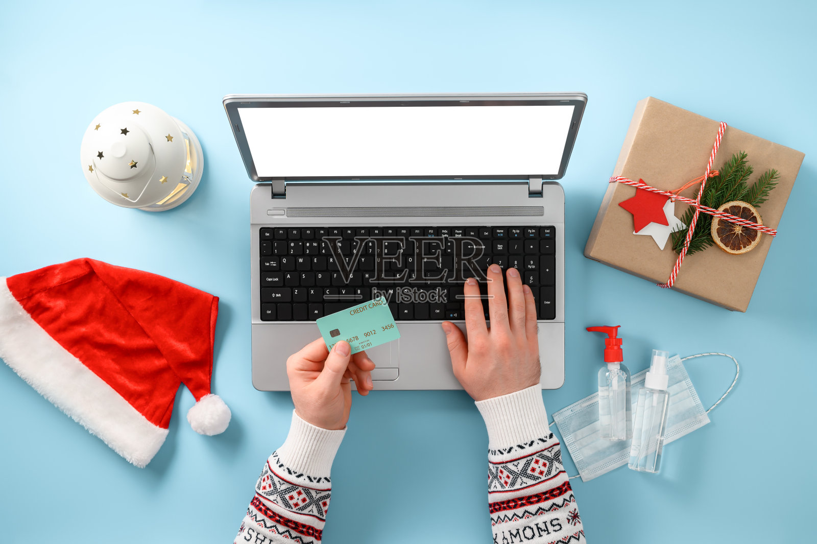 电子商务、网上购物和电子支付概念。新冠肺炎期间的圣诞网购主题。照片摄影图片