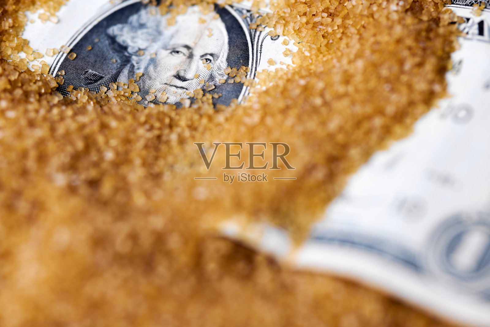 糖中的美元货币照片摄影图片