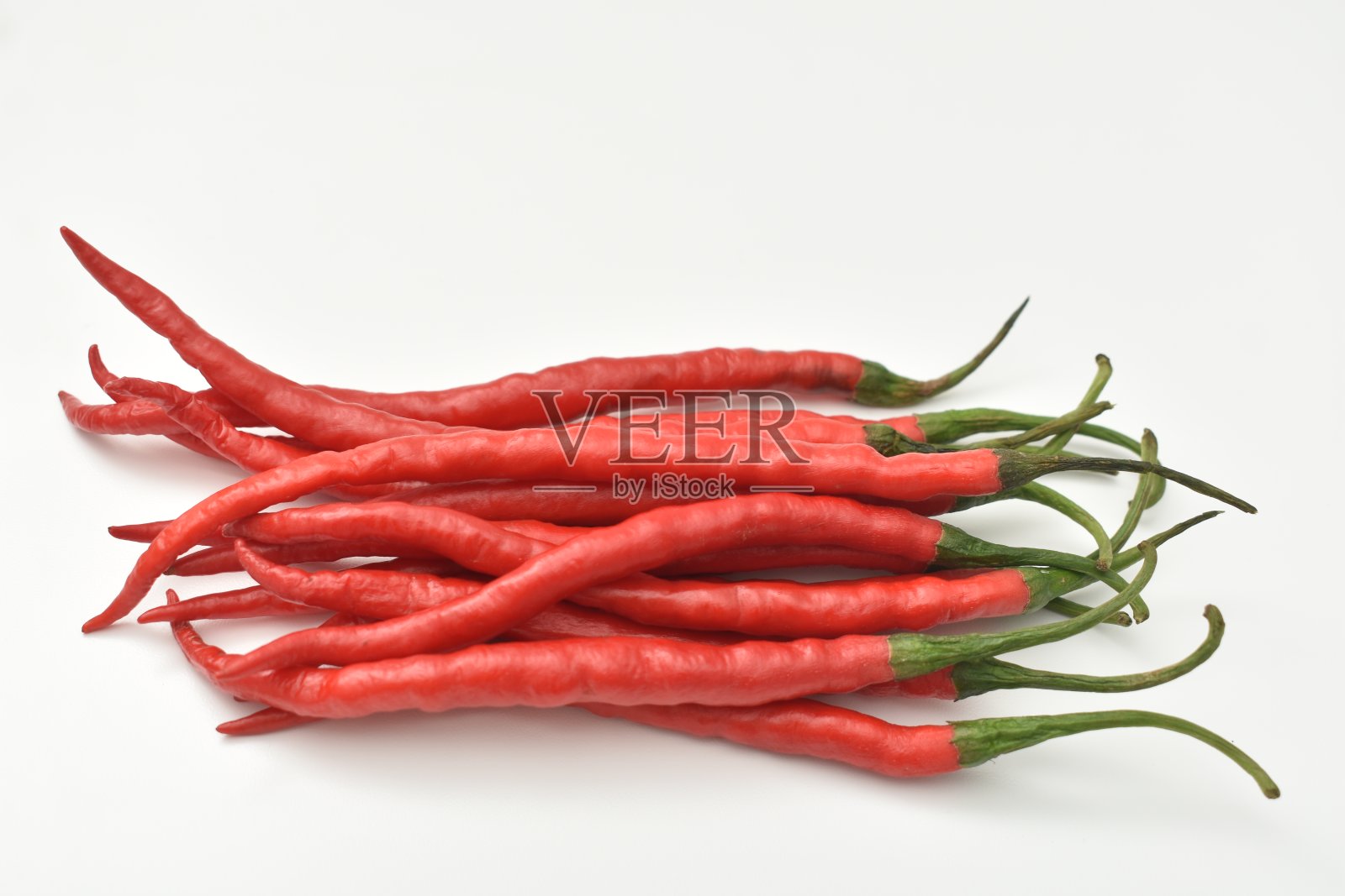 白背景上的红辣椒照片摄影图片