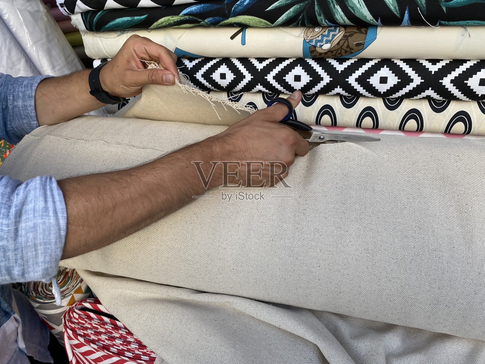 手裁织物照片摄影图片