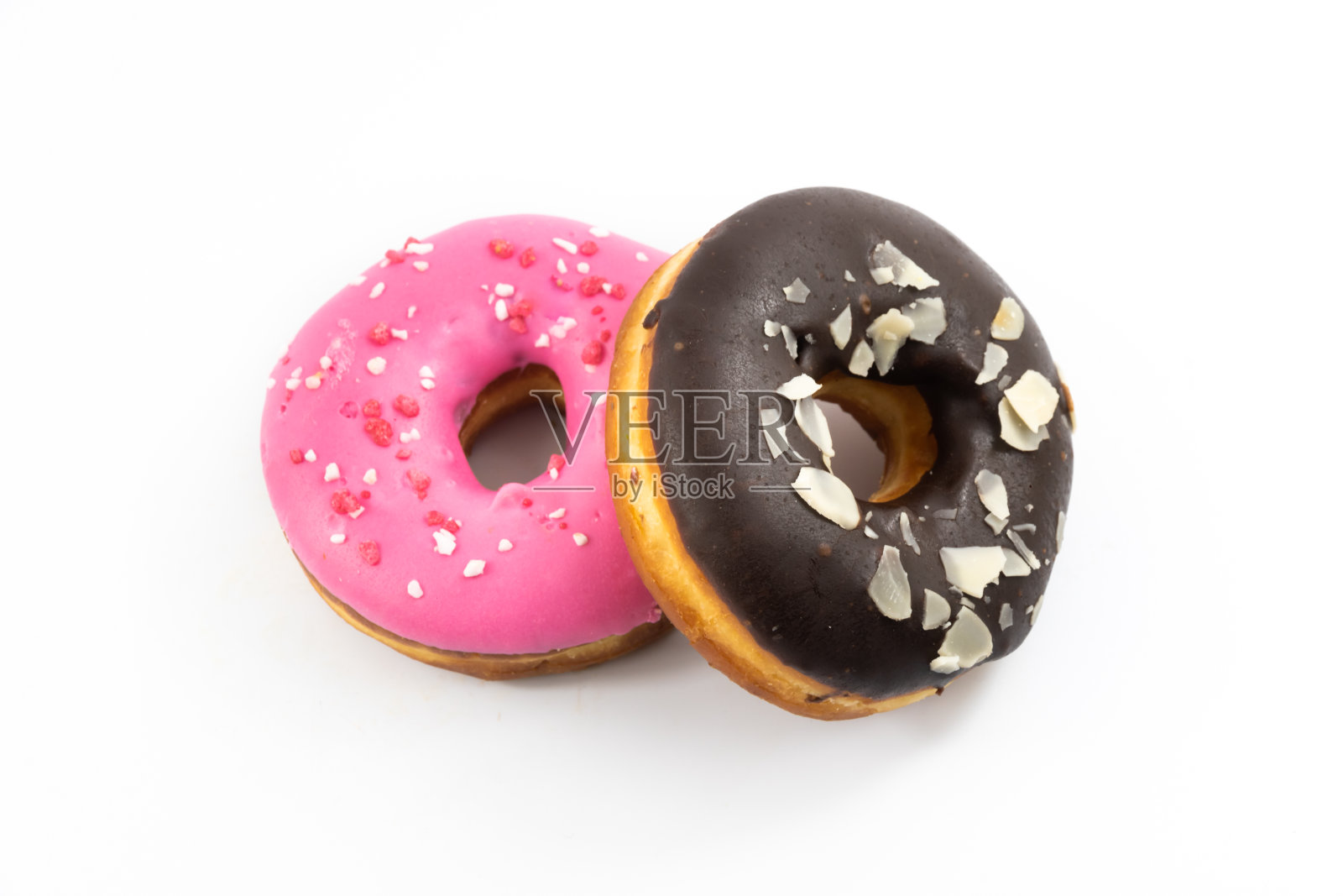 在白色孤立的背景上的甜甜圈俯视图的组成照片摄影图片