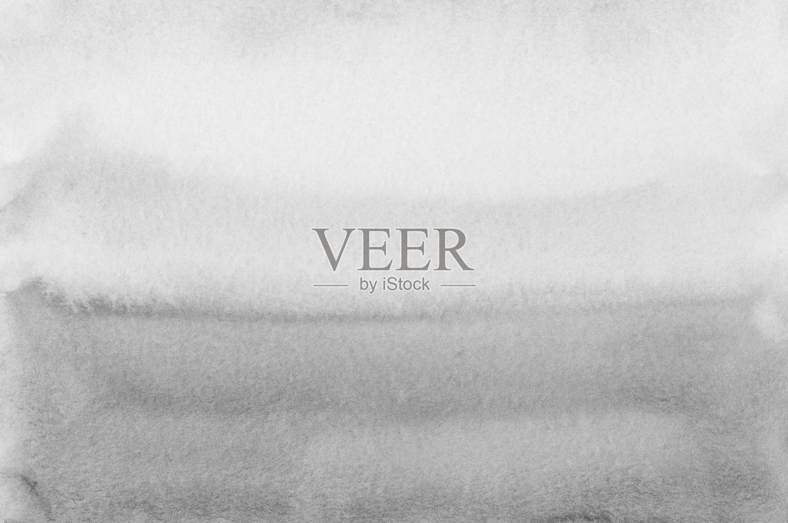 水彩浅灰色背景纹理。白色和灰色的背景。纸上有灰色污渍，手工上色。照片摄影图片