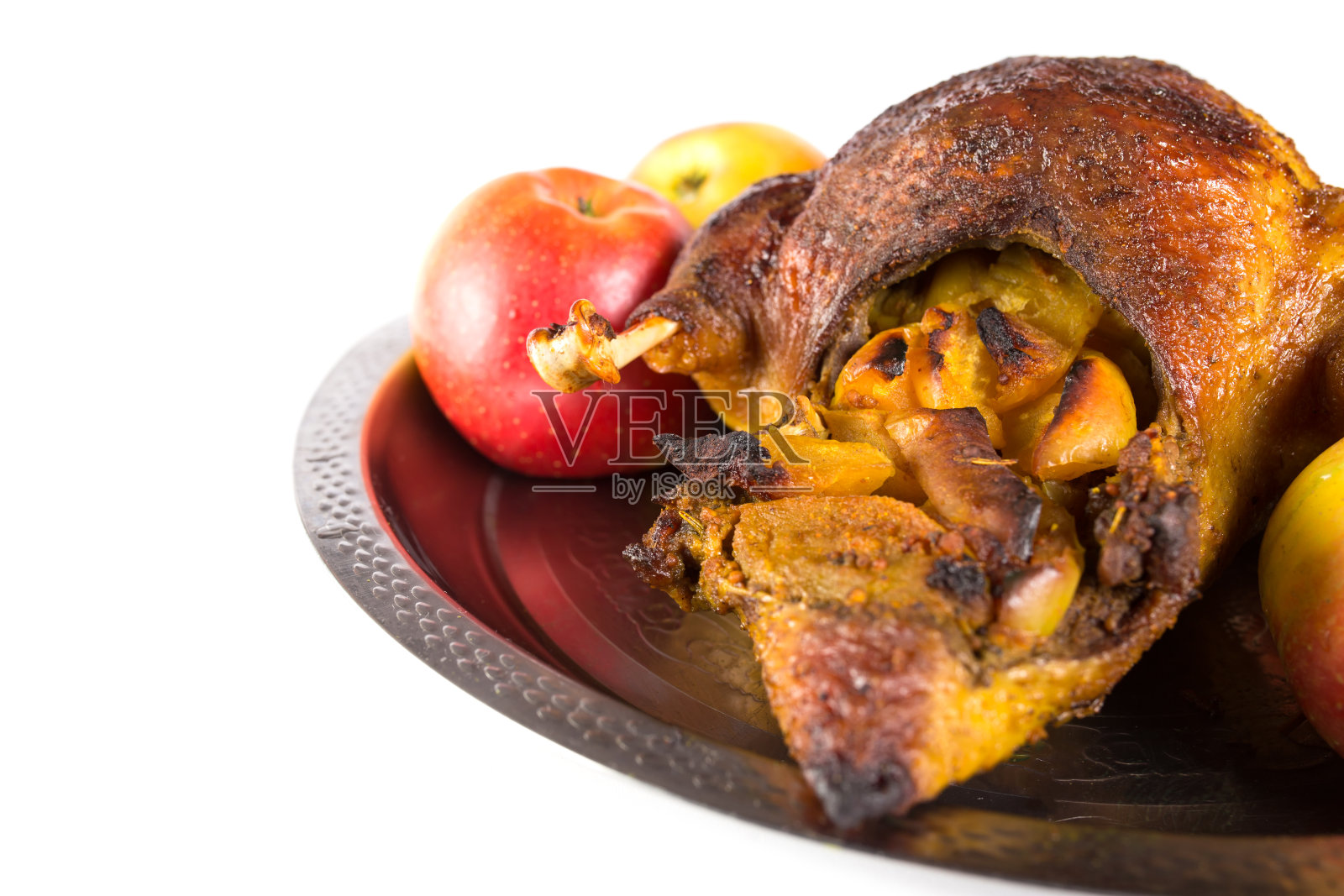 鸭子和苹果。烤箱里烤的香料照片摄影图片