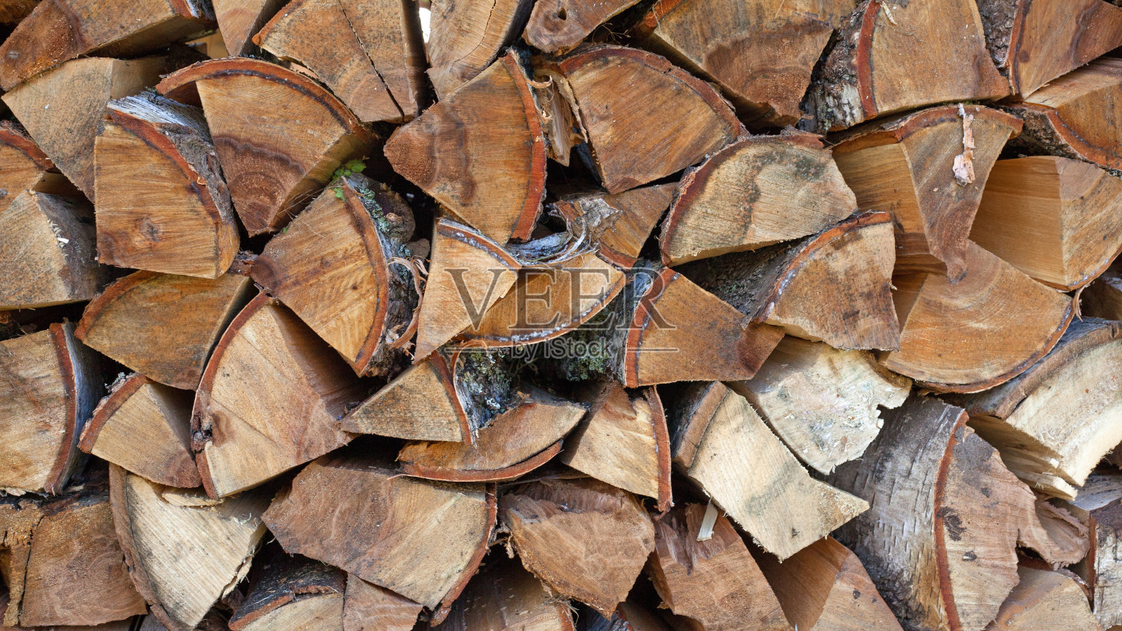 堆叠的砍过的原木木材背景照片摄影图片