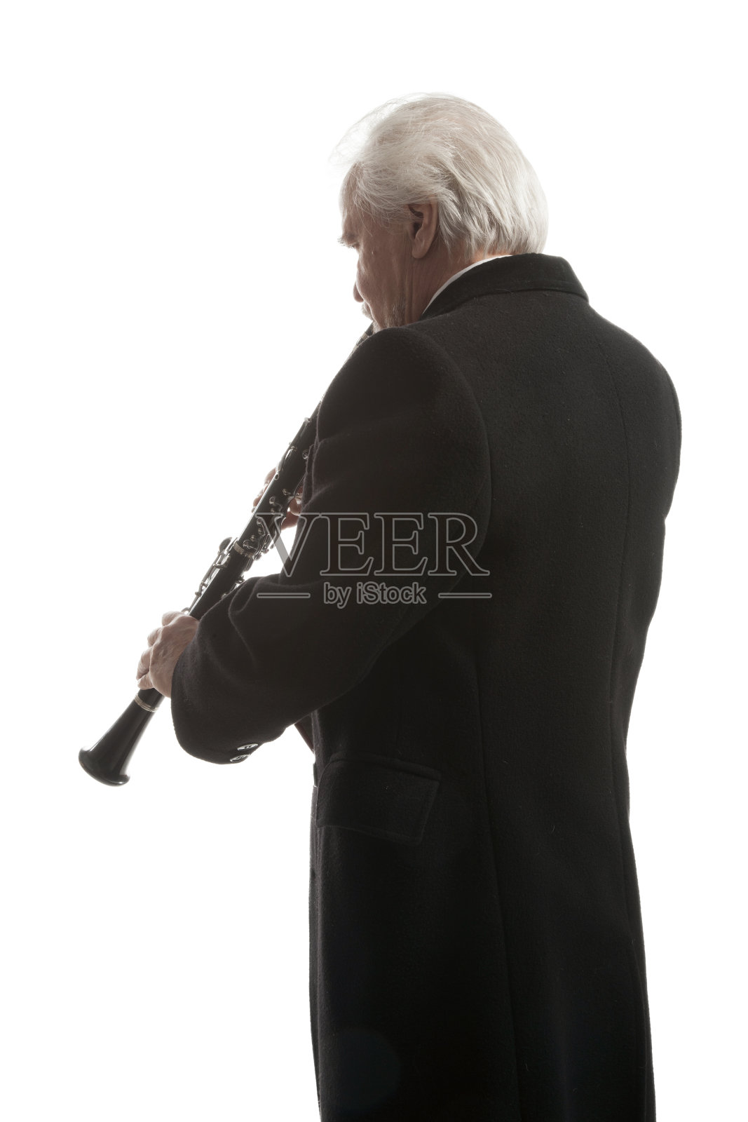 人演奏单簧管照片摄影图片