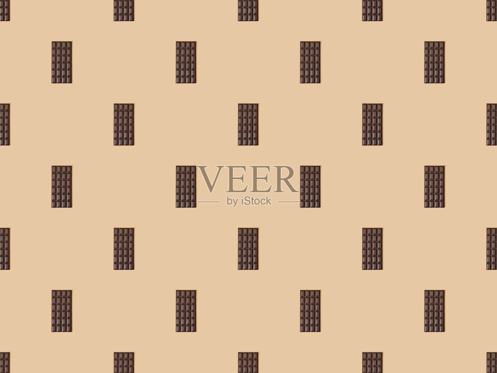 俯视图甜黑巧克力条米色背景，无缝模式照片摄影图片