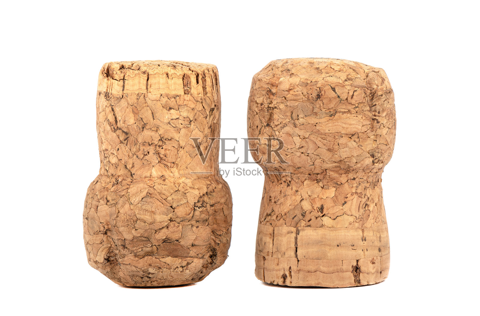 白色背景上的香槟软木塞。关闭了。照片摄影图片