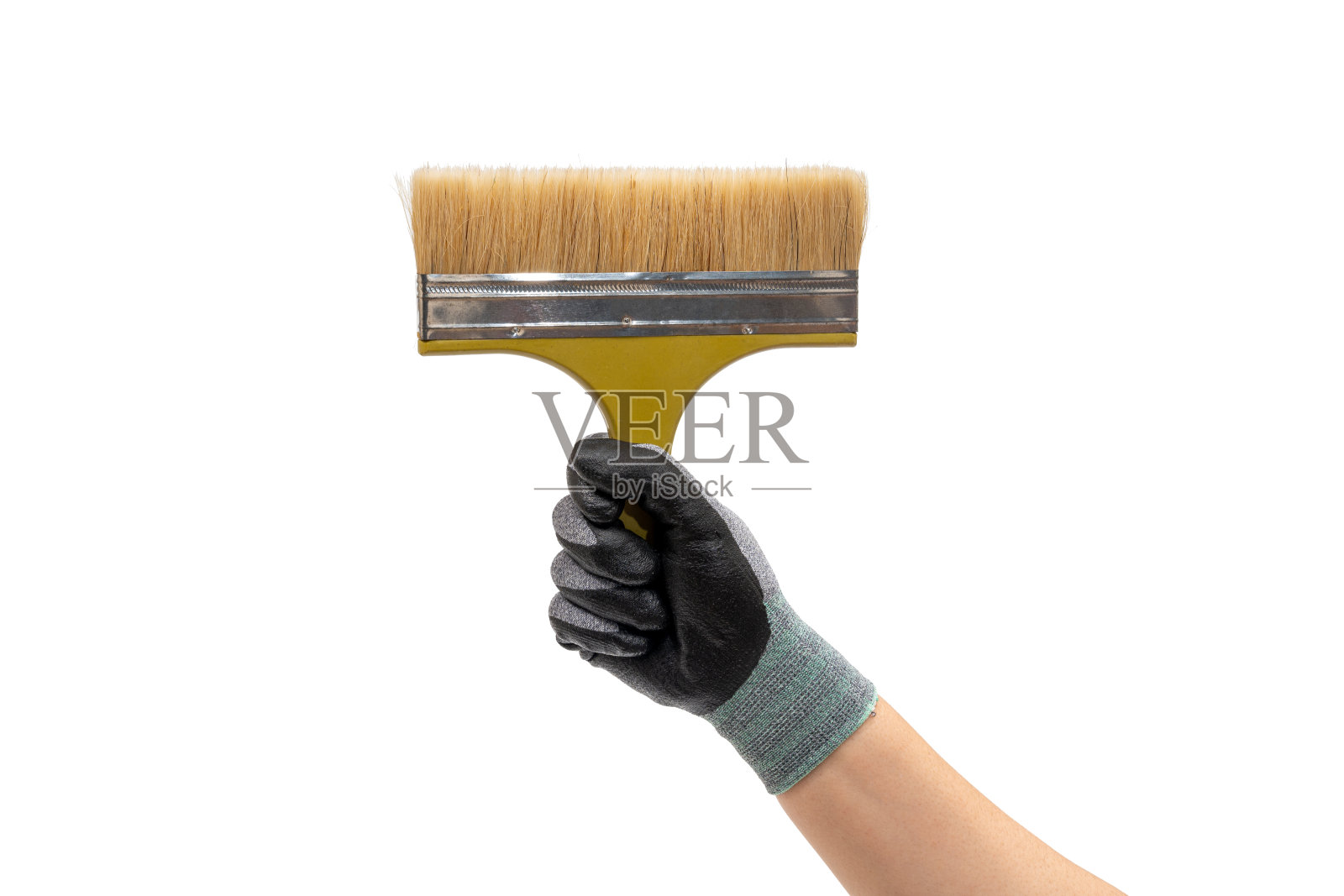 戴着手套拿着画笔的人的手。孤立的白色背景。照片摄影图片