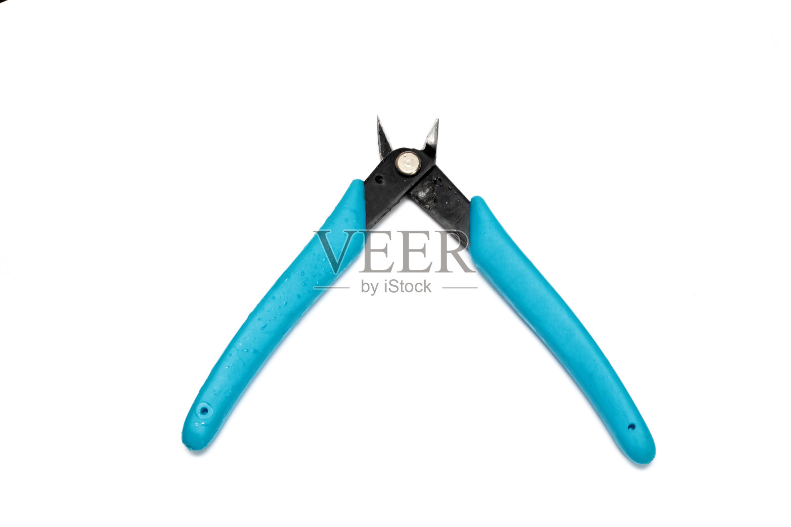 一只蓝色的钳子，孤立在白色的背景上照片摄影图片