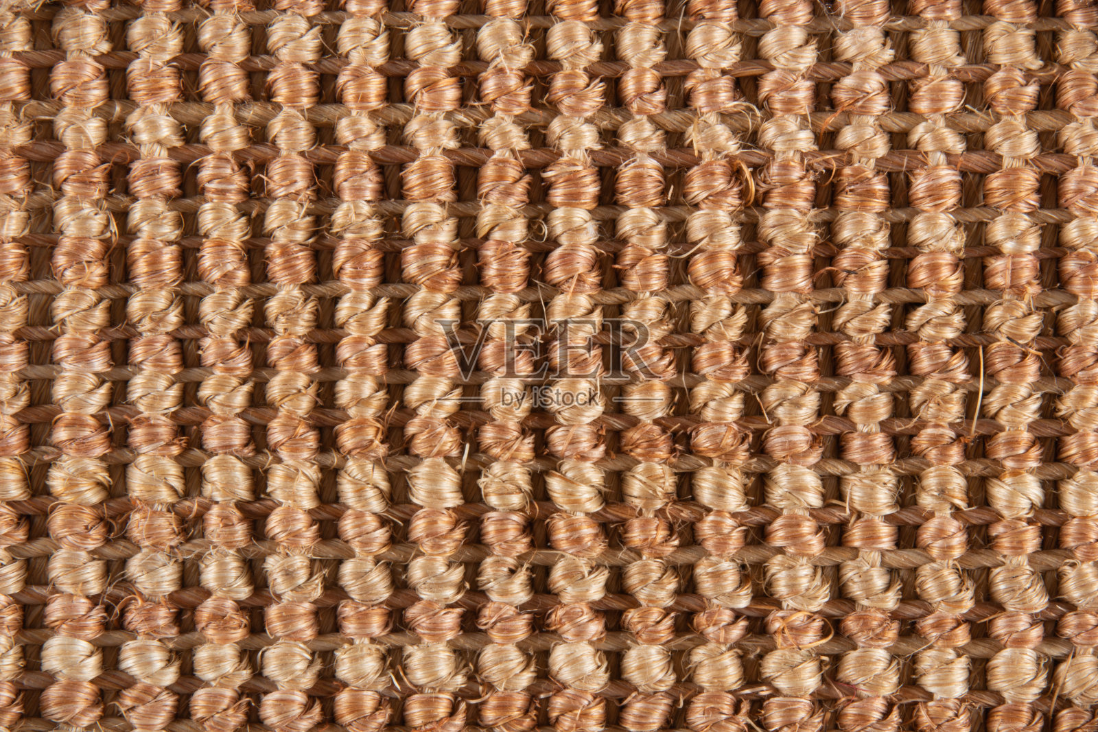手工制作的褐色草篮纹理细节。照片摄影图片