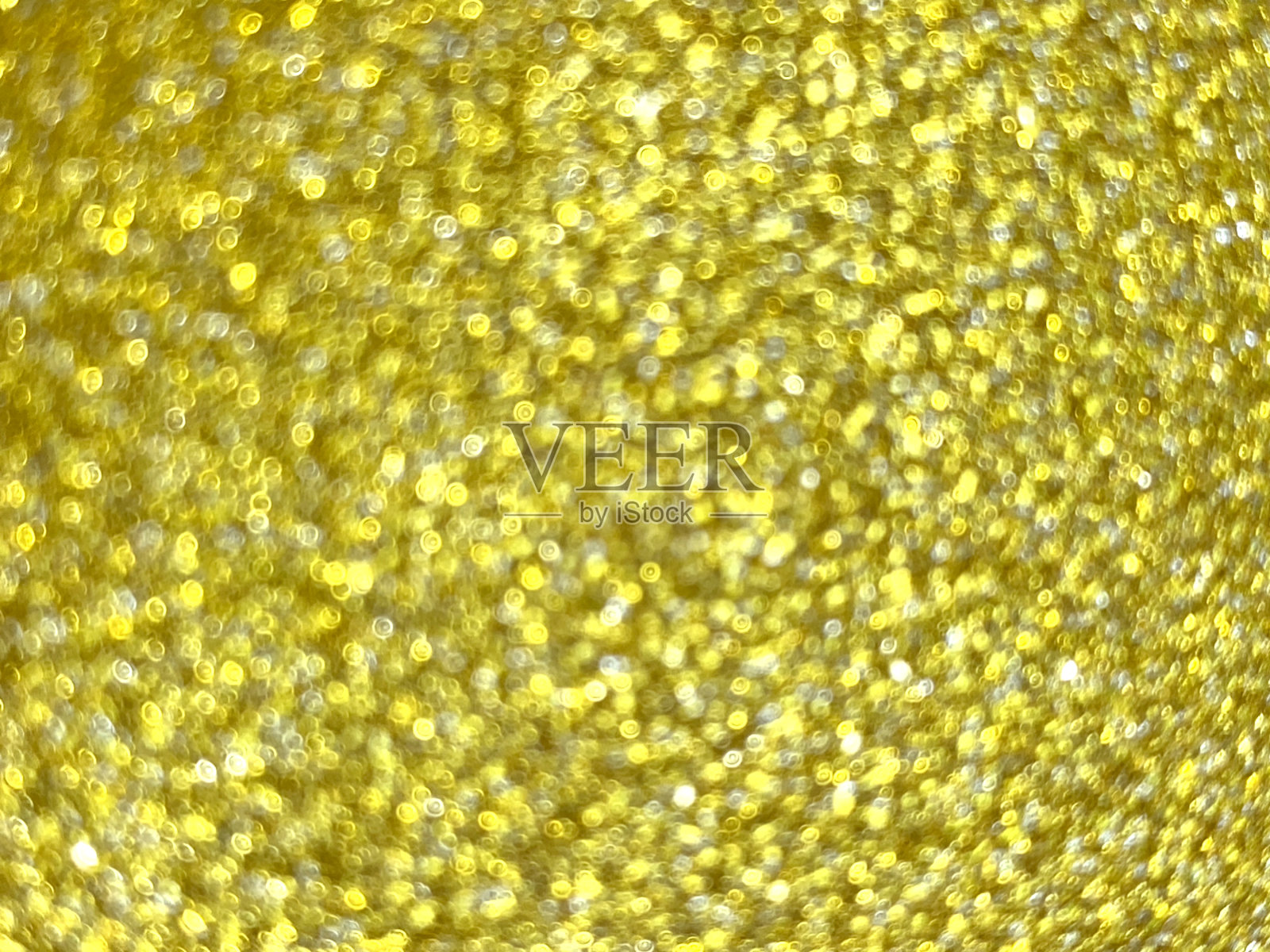 抽象纹理黄色多色模糊假日背景与散景，选择性聚焦。照片摄影图片