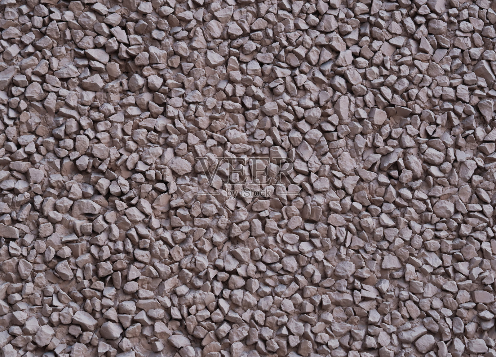 小石头的背景漆成浅棕色照片摄影图片